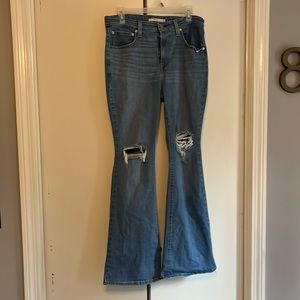 Women’s Levi’s 726 Flare size 31. Distressed denim